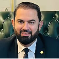 Headshot of Saeed Khan